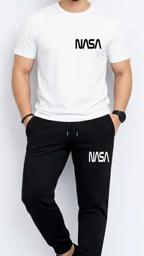 Person wearing a white NASA t-shirt and black pants on a white background
